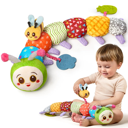 Colorful patchwork caterpillar stuffed animal toy with multiple textured fabric segments, teether attachments, and a baby playing with it