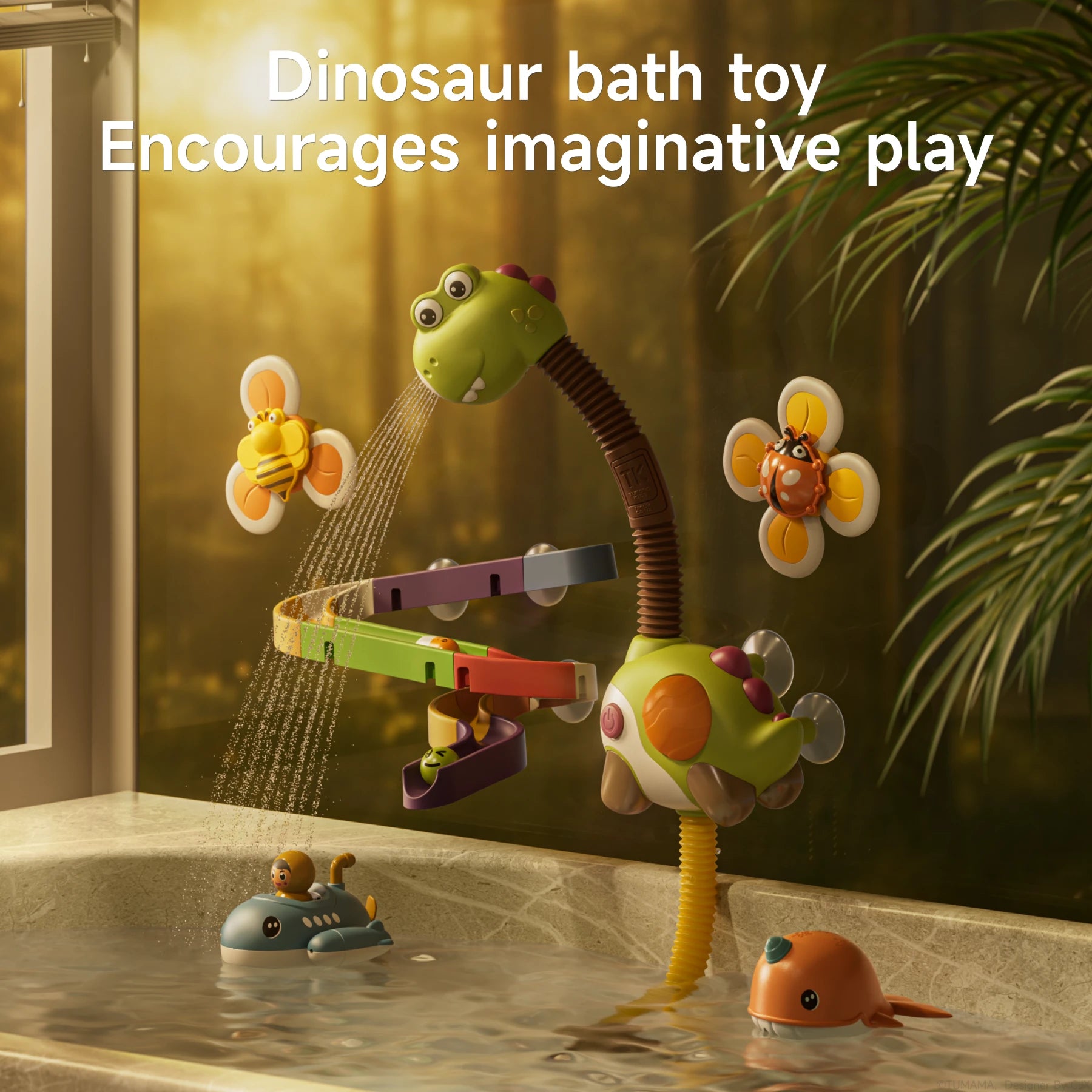 A playful dinosaur-themed bath toy is attached to the side of a bathtub. Water sprays from the dinosaur's mouth onto a colorful spiral track, with floating submarine and narwhal toys nearby. Flower-shaped suction cup toys with bee and ladybug designs are also attached to the tub. The scene is warmly lit, and the text reads "Dinosaur bath toy Encourages imaginative play."