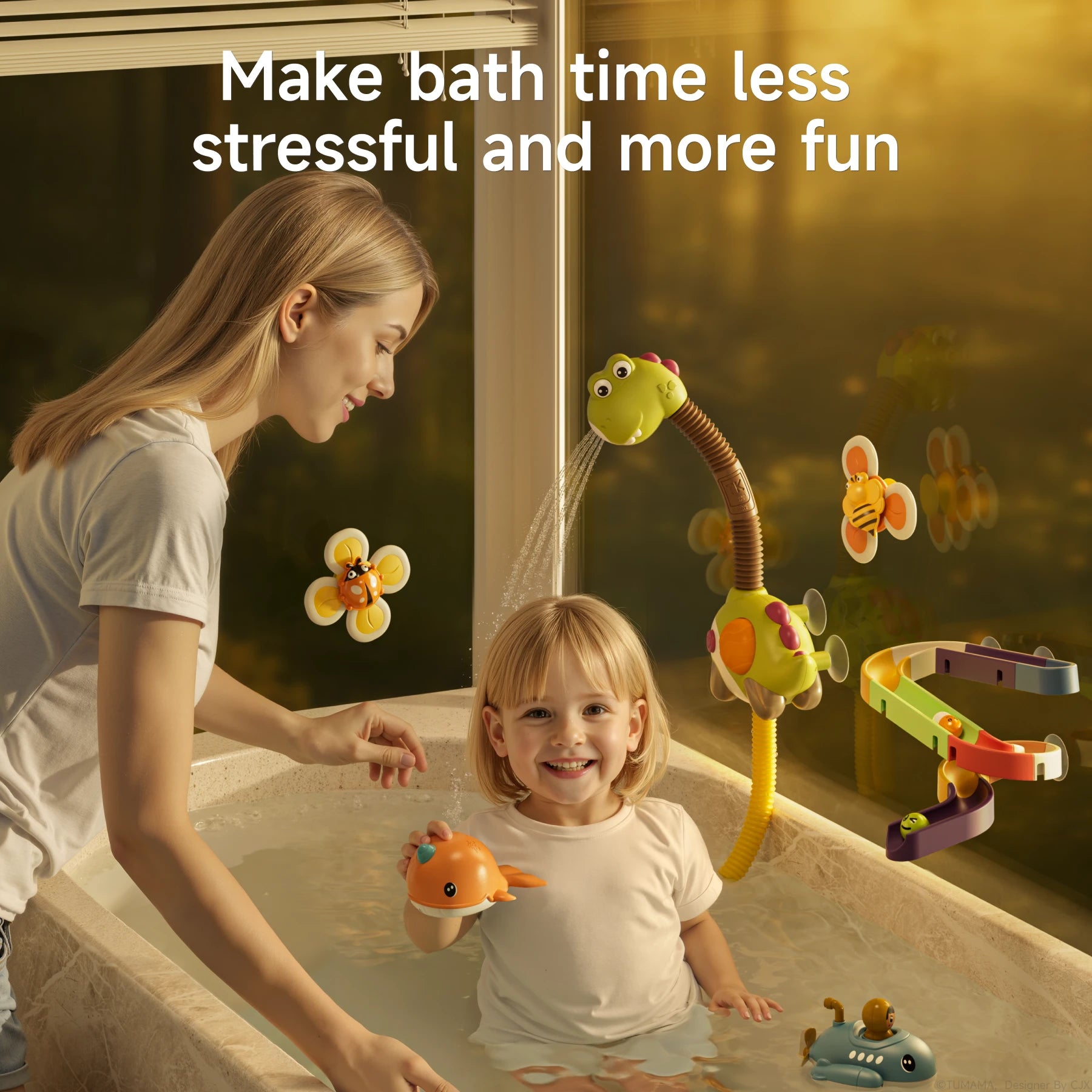 A smiling child enjoys bath time with a colorful dinosaur bath toy set, accompanied by a parent. The dinosaur toy sprays water onto a spiral track, with floating narwhal and submarine toys in the tub. Flower-shaped suction cup toys with bee and ladybug designs decorate the bath area. The text says, "Make bath time less stressful and more fun."