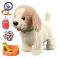 Fluffy battery-operated toy dog with beige ears and cream body wearing a green collar with a wooden bone tag, shown alongside its accessories: a purple paw-print remote control on an orange cable, a red toy bottle, a blue-orange-white rope ball, and an orange dog bowl with a green bone-shaped toy.