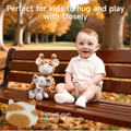 Smiling baby sitting on a park bench in autumn next to a plush giraffe and elephant toy set made with short soft plush fabric; highlighted close-up shows skin-friendly material, promoting comfort and safe playtime for young children.