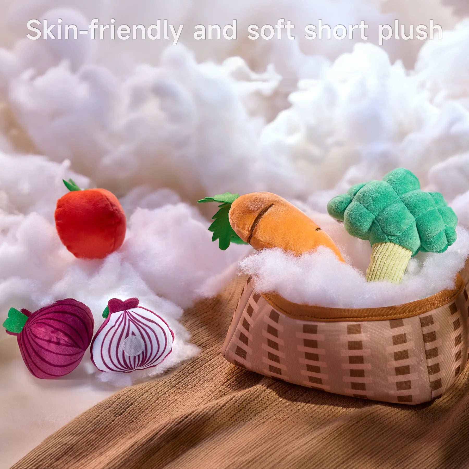 A group of plush felted vegetable toys is arranged on a soft, cloud-like textured surface. A brown and white checkered basket holds a green strawberry and a green broccoli, and a label on the image reads "Skin-friendly and soft short plush," emphasizing the gentle, child-safe material.