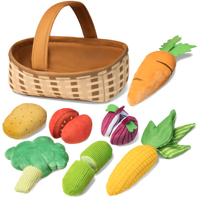 A set of interactive plush vegetable toys for babies, including a woven-style basket and various soft vegetables such as a carrot, potato, tomato, onion, broccoli, cucumber, and corn. The toys are colorful and cute, designed for babies to grasp and play with.