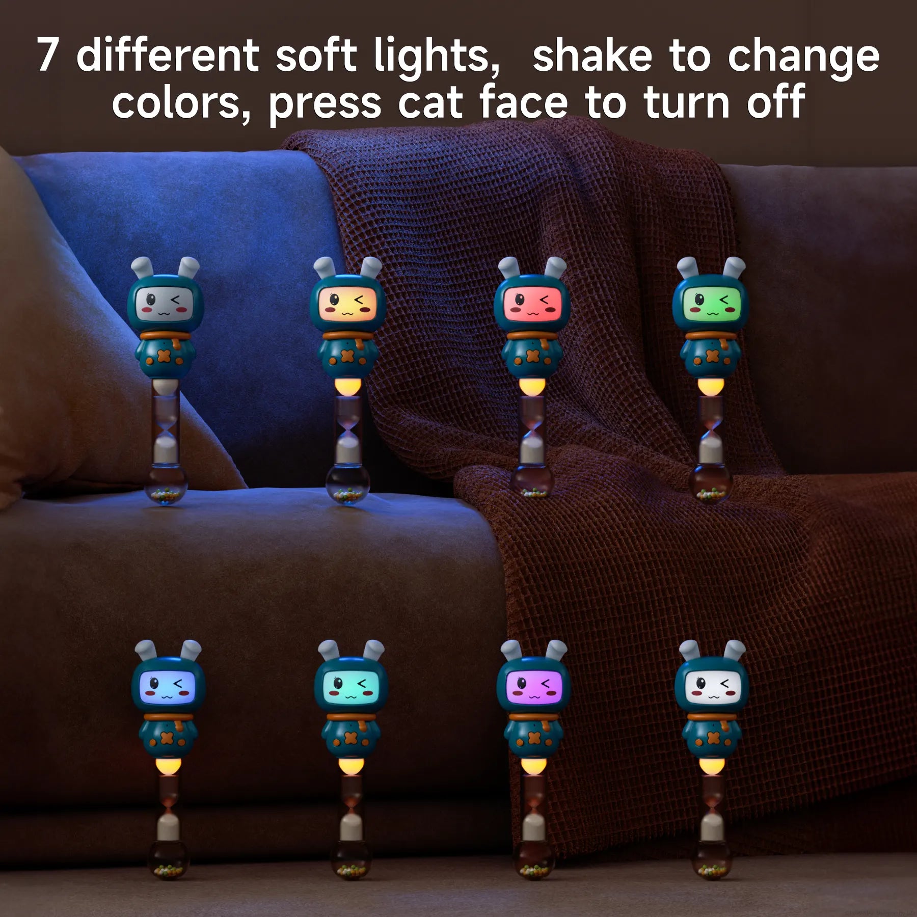 Seven blue bunny-shaped musical rattles with teether ears displayed on a sofa in a dark room. Each toy glows in a different soft light color, including blue, yellow, pink, green, and purple. Text at the top explains the toy can change colors by shaking and can be turned off by pressing the face.