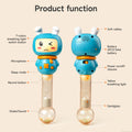 Front and back view of a blue bunny-shaped musical rattle with labeled features. The front shows the 7-color breathing light switch button, microphone, sleep mode button, record button, and sand-filled transparent handle. The back shows the soft teether ears, battery compartment for 2 AAA batteries, power on/off and volume button, yellow breathing light, and sandglass effect in the handle.