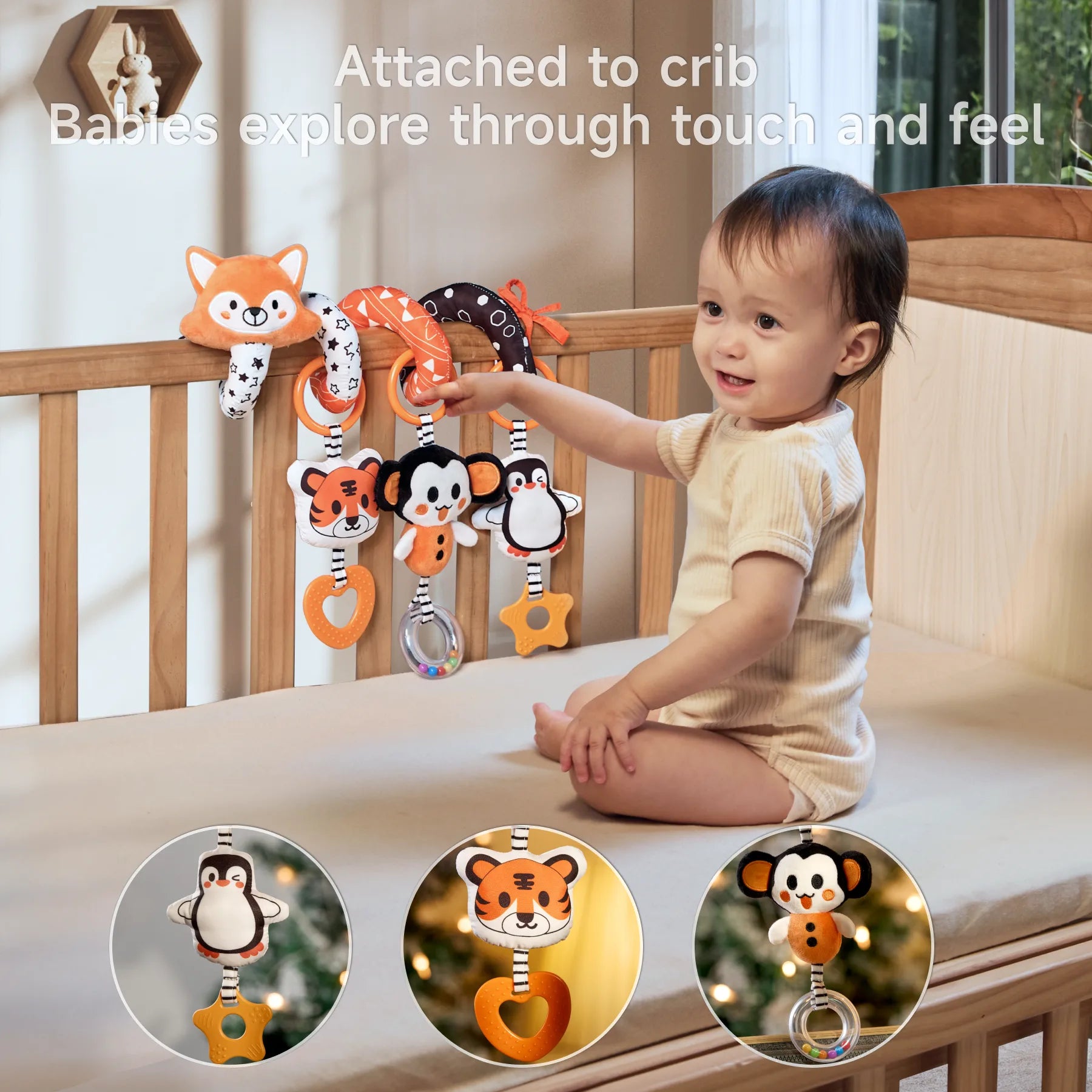 Cute fox spiral toy fixed in the crib, baby is playing with the plush toy hanging from the spiral toy