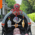 Baby-arch-stroller-toy-soothes-your-baby-on-the-go