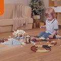 CHILDREN HAPPILY PLAYING SPLICED DINOSAUR TOY CAR RACE TRACK