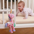 Baby-chews-and-plays-with-this-pink-horse-plush-hanging-rattle